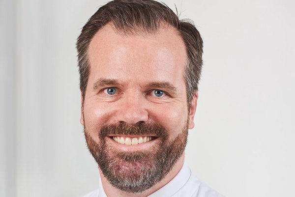 Porträtaufnahme von Prof. Dr. Oliver Husser