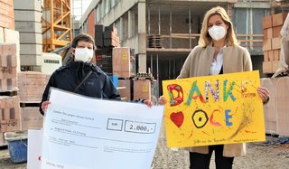 2.000 Euro-Spende für Kinder mit Behinderung 