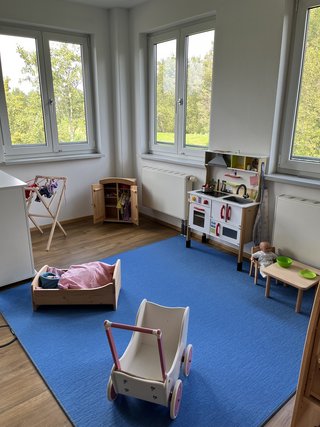 Lernen und Spaß in der Puppenecke